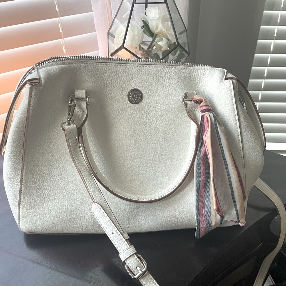 Anne Klein white purse.